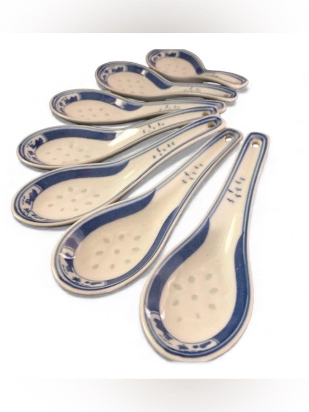 7 Jingdezhen porcelain soup spoons with traditional blue-and-white bird motif